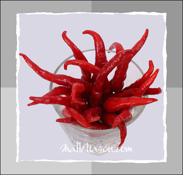 ownloadable image of chillis in a glass